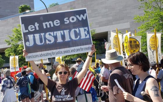 Members of Catholic groups take part in the Moral March on Washington on June 18 sponsored by the Poor People's Campaign. The Catholic contingent was organized by Network, a Catholic social justice lobby; the Leadership Conference of Women; the Sisters of