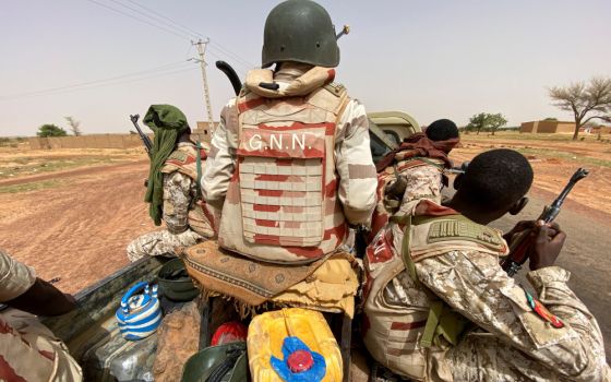 A convoy of Nigerian soldiers patrol outside the town of Ouallam July 6, 2021. Church leaders are pushing to expand their peacekeeping role in Africa. (CNS/Reuters/Media Coulibaly)