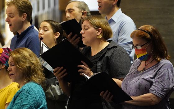 Choir members sing during a Mass at St. Paul the Apostle Church June 25 in New York City for participants of the Outreach LGBTQ Catholic Ministry Conference. (CNS/Gregory A. Shemitz)