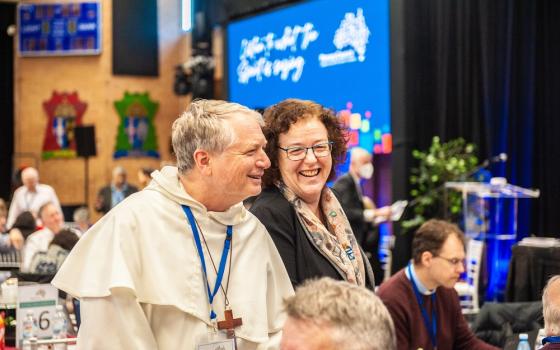 Archbishop Anthony Fisher of Sydney and Jacinta Collins, national Catholic Education Commission chair, talk during the final day of the Second Assembly of the Plenary Council of the Australian Catholic church in Sydney on July 8. (CNS/The Catholic Weekly/