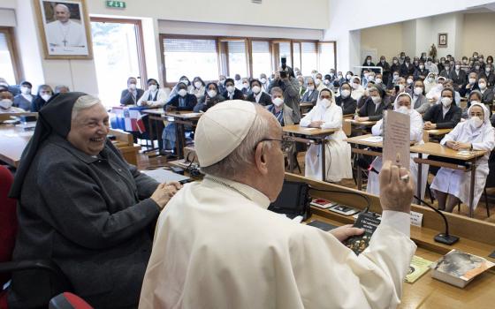 Sr. Yvonne Reungoat, the newest member of the Dicastery for Bishops, is pictured with Pope Francis during an Oct. 22, 2021, meeting with members of the order in Rome. (CNS/Vatican Media)