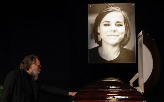 Russian political scientist and ideologue Alexander Dugin mourns for his daughter, Darya Dugina, who was killed in a car bomb attack, during a memorial service in Moscow Aug. 23, 2022.