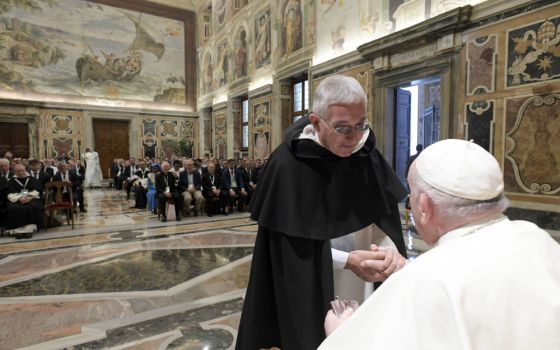 Pope Francis greets Dominican Father Serge-Thomas Bonino, president of the Pontifical Academy of St. Thomas Aquinas, during an audience with participants attending the International Thomistic Congress, at the Vatican Sept. 22, 2022