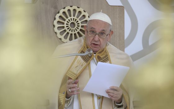 Pope Francis speaks as he celebrates the closing Mass of Italy's National Eucharistic Congress at the municipal stadium in Matera, Italy, Sept. 25, 2022