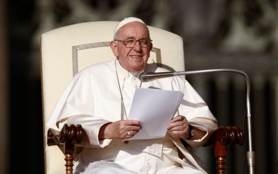 Pope Francis smiles during his general audience in St. Peter's Square at the Vatican Oct. 12, 2022