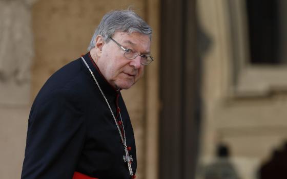 Australian Cardinal George Pell is pictured during the extraordinary Synod of Bishops on the family at the Vatican in this Oct. 6, 2014, file photo. (CNS/Paul Haring)