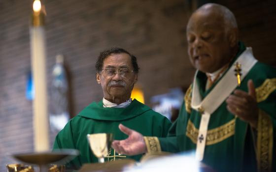 Washington Cardinal Wilton Gregory celebrates the annual Mass commemorating the legacy of the Rev. Martin Luther King Jr. on Jan. 15, 2023 at St. Joseph Church in Upper Marlboro, Maryland. At left is Washington Auxiliary Bishop Roy Campbell Jr., the pastor of St. Joseph's who concelebrated the Mass sponsored by the Office of Cultural Diversity of the archdiocese. (OSV News photo/Tyler Orsburn, Catholic Standard)