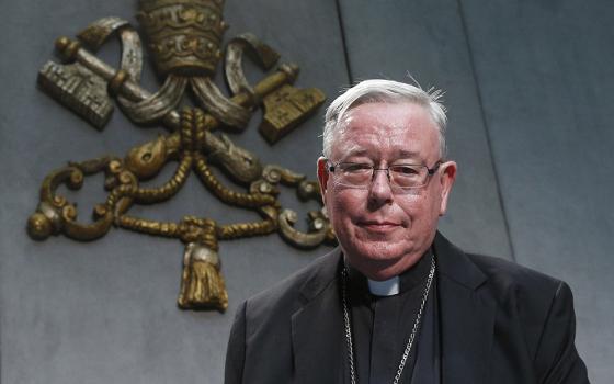 Cardinal Jean-Claude Hollerich of Luxembourg, relator general of the Synod of Bishops, arrives for a news conference to present an update on the synod process at the Vatican Aug. 26, 2022. (CNS/Paul Haring)