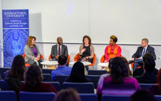 From left: Dawn Carpenter, founding director of the Solidarity Economy Workshop; Willie Lyles III, legislative director for Rep. James Clyburn, D-South Carolina; moderator Anna Gordon, program director of Georgetown University's Initiative on Catholic Social Thought; Candace Cunningham, workforce development coordinator with Restaurant Opportunities Centers United DC; and Robert Christian III, editor of Millennial gather for Georgetown's panel "Young Catholics, Work and Labor in the New Economy" held March 