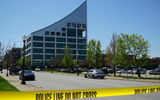 Police tape cordoned off North Preston Street at Witherspoon in downtown Louisville, Kentucky, after a mass shooting April 10 in the Old National Bank building. A gunman opened fire at a bank in downtown Louisville that morning, killing at least four people and sending nine to the hospital before he died by gunfire at the scene, Louisville Metro Police Deputy Chief Paul Humphrey said. (OSV News/The Record Newspaper/Marnie McAllister)