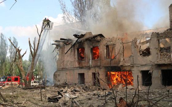 Rescuers work at a site of a clinic heavily destroyed by a Russian missile strike, amid Russia's attack in Dnipro, Ukraine, May 26. (OSV News/Press service of the State Emergency Service of Ukraine handout via Reuters)