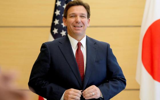 Florida Gov. Ron DeSantis smiles in Tokyo, Japan, April 24, during an international trade mission. (OSV News/Kimimasa Mayama, pool via Reuters)