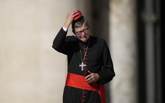 Cardinal Rainer Maria Woelki attends Pope Francis' weekly general audience in St. Peter's Square at The Vatican, Wednesday, Oct. 5, 2022. German authorities say police and prosecutors have searching Catholic Church properties in connection with a probe of the archbishop of Cologne over perjury allegations. Investigators on Tuesday also searched the premises of an IT company that provides email services to the archdiocese headed by Cardinal Rainer Maria Woelki.(AP Photo/Alessandra Tarantino, File)