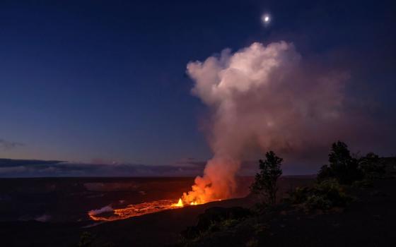 In this photo provided by the National Park Service lava spews from the Kilauea volcano in Hawaii, Wednesday, June 7, 2023.