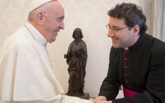 Pope Francis greets then-Msgr. Frank Leo of Montreal during a meeting at the Vatican Dec. 6, 2018. The Vatican announced Feb. 11 that Francis had accepted the resignation of Cardinal Thomas Collins as archbishop of Toronto and named Archbishop-designate Leo as his successor. (OSV News/Vatican Media)