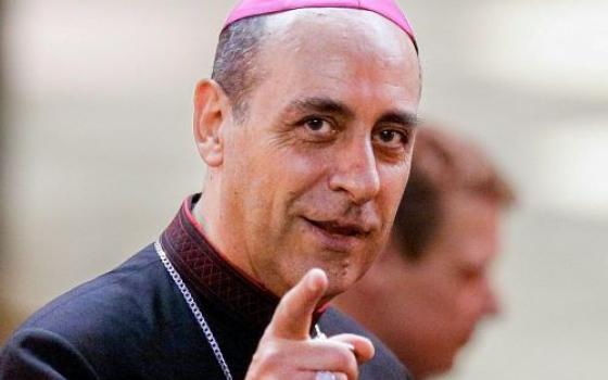 Archbishop Víctor Manuel Fernández, appointed prefect of the Dicastery for the Doctrine of the Faith by Pope Francis July 1, is pictured in this file photo at the conclusion of extraordinary Synod of Bishops on the family at the Vatican Oct. 18, 2014. (CNS/Paul Haring)