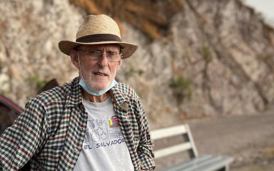 Franciscan Fr. Brendan Forde takes a break on his way home to Las Vueltas, Chalatenango in northern El Salvador, April 13, 2021. Forde, an Irish missionary friar, was living and serving in Las Vueltas but died July 8 during a visit to his native Ireland. (NCR photo/Rhina Guidos)