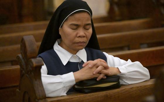 A nun prays in St. Saviour Monastery on the day of prayers and fasting for peace in the Old City of Jerusalem on Oct.17. (OSV News/Debbie Hill)