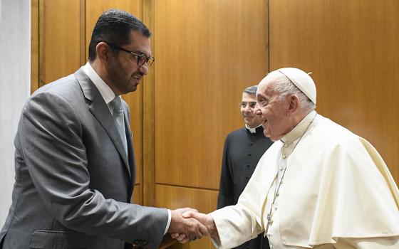 Pope Francis welcomes Sultan al-Jaber, the president-designate of the 2023 United Nations Climate Change Conference, known as COP28, to the Vatican Oct. 11. COP28 is set to open Nov. 30 in Dubai, United Arab Emirates. (CNS/Vatican Media)