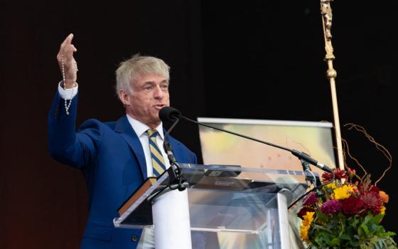 Michael Voris, founder of Church Militant, leads the praying of the rosary in Baltimore Nov. 16, 2021, during the organization's rally near the hotel where the U.S. Conference of Catholic Bishops was holding its fall general assembly Nov. 15-18. (CNS photo/Kevin J. Parks, Catholic Review)