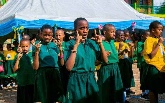 Students communicate using sign language