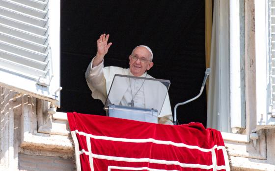 Pope Francis greets visitors in St. Peter's Square at the Vatican to pray the Angelus Aug. 20, 2023. (CNS/Vatican Media)