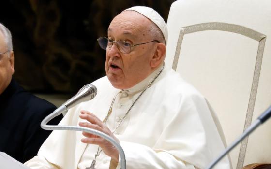 Pope Francis speaks to visitors during his weekly general audience in the Paul VI Audience Hall at the Vatican Jan. 10, 2024. (CNS photo/Lola Gomez)