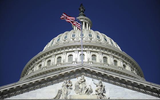 A file photo shows the American flag below the U.S. Capitol dome in Washington. A traditional Latin Mass was held at the capitol Jan. 23, 2024. (OSV News/Reuters/Jonathan Ernst)