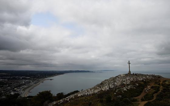 A huge cross is seen overlooking the Eastern Irish coastline of Counties Wicklow and Dublin in Bray, Ireland, Aug. 19, 2018. (OSV News/Reuters/Clodagh Kilcoyne)