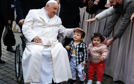 Pope Francis greets children at general audience