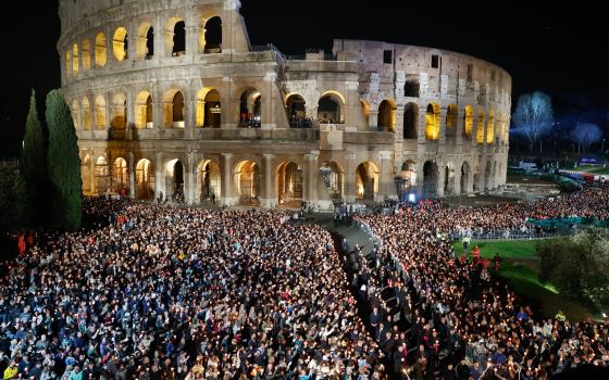 About 25,000 people attend the Good Friday Way of the Cross service at Rome's Colosseum March 29, 2024. (CNS photo/Lola Gomez)