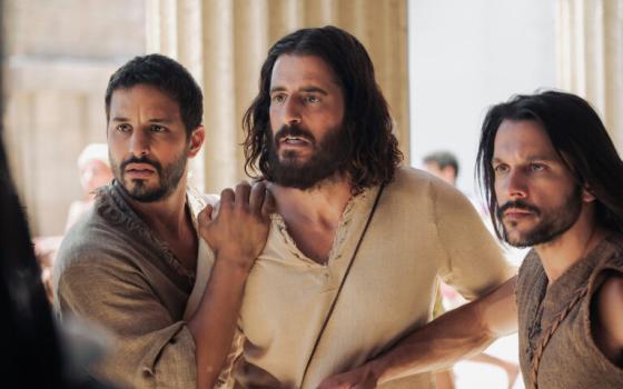 Actor Jonathan Roumie, center, portrays Jesus Christ in Season Four of the series “The Chosen.”