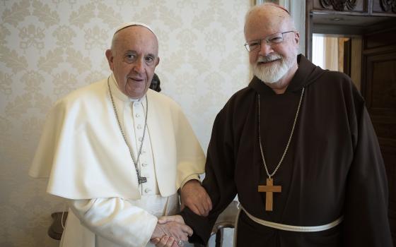 Pope Francis poses for a photo with Cardinal Sean P. O'Malley of Boston, president of the Pontifical Commission for the Protection of Minors, during a private audience at the Vatican April 4, 2019. Cardinal O'Malley was at the Vatican for meetings of the commission and also the Council of Cardinals, a group that advises Pope Francis. (CNS photo/Vatican Media) See POPE-OMALLEY-COMMISSION April 8, 2019.