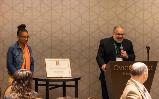 Bishop John Stowe of Lexington, Kentucky, speaks during a breakfast awards ceremony June 11 in Louisville, Kentucky. Stowe received the Dorothy Day Guild's initial Dorothy Day Peacemaker Award on behalf of Pax Christi USA. Stowe is president of Pax Christi USA's national council. (Courtesy of Pax Christi USA)