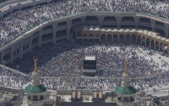 Immense mosque courtyard filled with people