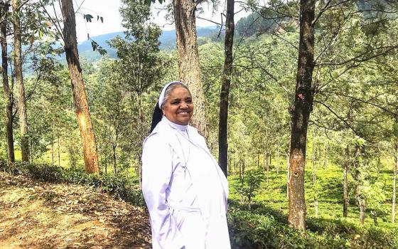 Apostolic Carmel Sr. Maria Amali at a tea plantation at Pussellawa in Sri Lanka, where she visits workers, despite her painful abdominal cancer (Thomas Scaria)