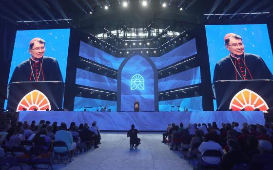 Cardinal Christophe Pierre, the Vatican nuncio to the United States, speaks during the opening revival night of the National Eucharistic Congress, July 17 at Lucas Oil Stadium in Indianapolis. (OSV News/Bob Roller)