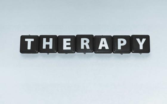 tiles spell "therapy"