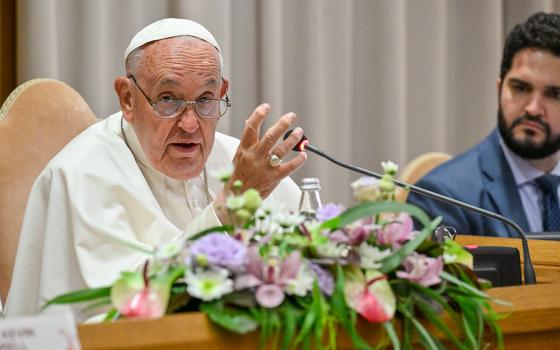 Pope Francis speaks to participants in a conference of moderators of associations of the faithful, ecclesial movements and new movements in the New Synod Hall at the Vatican June 13. (CNS/Vatican Media)