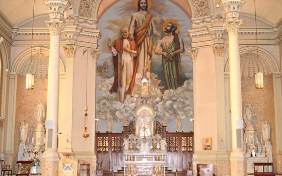 A mural is seen above the altar at St. Peter Catholic Church, Aug. 22 in Steubenville, Ohio. Fr. Bradley Greer, chancellor of the Diocese of Steubenville, and Fr. Timothy Huffman, parochial vicar at St. Peter, are seeking legal custody of a small child in an unusual case scheduled for a juvenile court hearing in October. (OSV News/Christopher Dacanay)