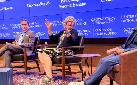 Robert Jones (left) of the Public Religion Research Institute and Social Service Sr. Simone Campbell of Understanding US speak at the September conference "Test of Faith: A Summit to Defend Democracy," hosted by the Center on Faith and Justice at Georgetown University. (Photo by David DeCosse)