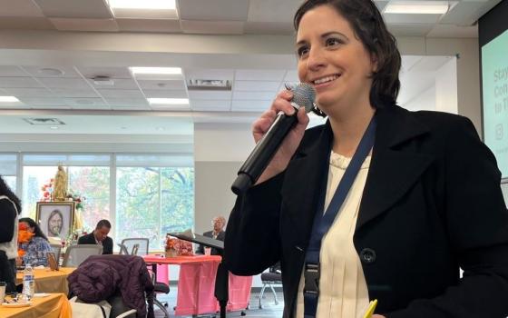 Annie Nieto Bailey, a young adult leader from the Archdiocese of Seattle, leads a plenary session at the 2024 LaRED annual meeting at Marian University in Indianapolis. (Luis Donaldo González)