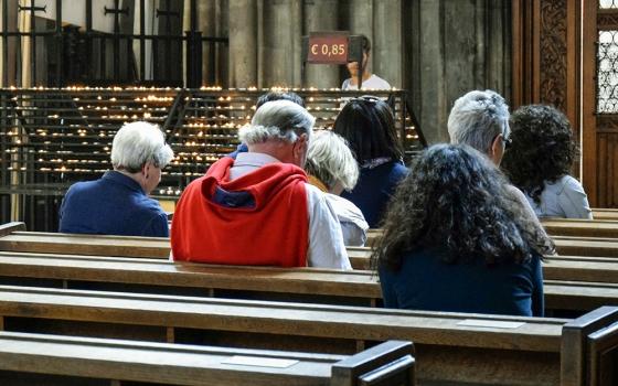 Parishioners pray during Mass at a Catholic church in Vienna in May 2019. Many of the recommendations from the final report of the 2021-24 synod on synodality are already being practiced, the Austrian bishops said in a statement, not least through the 40,000 elected members working in the church's parish councils and asset management boards. (Dreamstime/Marina Novitkaia)