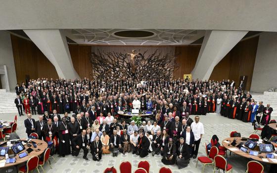 Pope Francis and members of the Synod of Bishops on synodality pose for a photo after the synod's final working session Oct. 26, 2024, in the Paul VI Audience Hall at the Vatican. (CNS/Vatican Media)