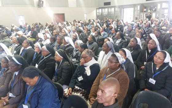 large group at symposium