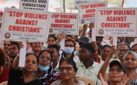 People hold placards during a protest in Mumbai, India, April 12, 2023, against what they claim are attacks on the Christian community, churches and institutions across India. (OSV News/Reuters/Francis Mascarenhas)