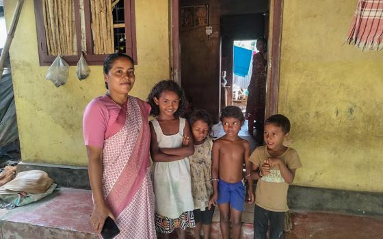 Charity Sr. Joicy Joy with children of Panthalam Unnati, an enclave in Kakkavayal, a village in the Wayanad district of Kerala, India. (George Kommattam)