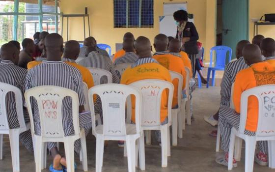 Inmates at Nairobi West Prison, listen to a presentation by legal advocates during Legal Awareness Week on Oct. 30, 2024. The annual initiative, organized by the Law Society of Kenya, promotes access to justice, legal education, and seeks to address prison congestion across the country. (Courtesy of Hedwig Muse)