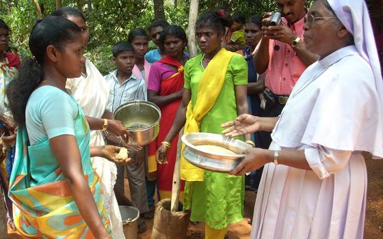 Sr. Innocent Joseph Ayyankanal, a member of the Missionary Sisters of Mary Immaculate, teaches tribal communities how to prepare herbal medicines at their homes in the Wayanad district of Kerala, southwestern India. (Courtesy of Sr. Innocent Ayyankanal)
