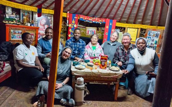 Consolata Missionary Sisters and Fathers visit a family in Arvaikheer, Mongolia. (Courtesy of Francesca Allasia)